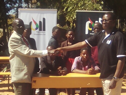 Petroleum Importers Limited donates desks to Linga CDSS in Nkhotakota