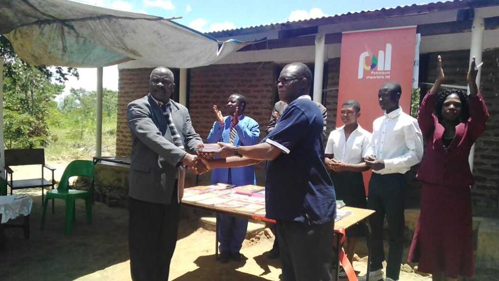 Petroleum Importers Limited boosts Chitenje CDSS’ literacy with MK1.5 million text books donation