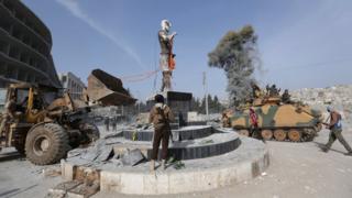 Syria war: Turkey-backed forces oust Kurds from heart of Afrin