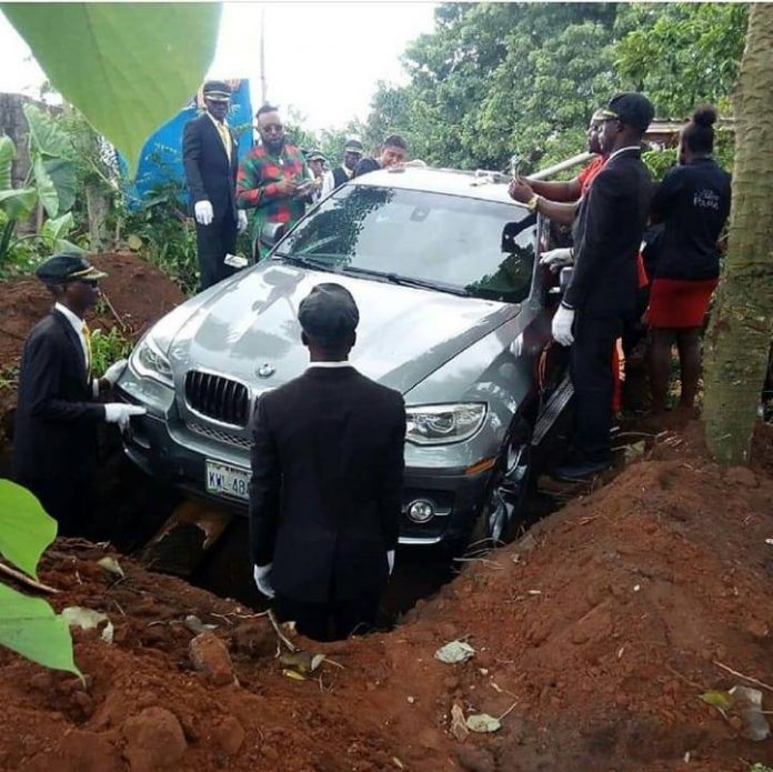 Bizarre; Nigerian man buries father in brand new BMW X6