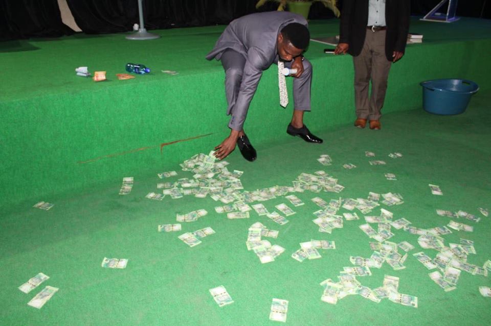 South African Prophet Seer1 Vomits money during church service