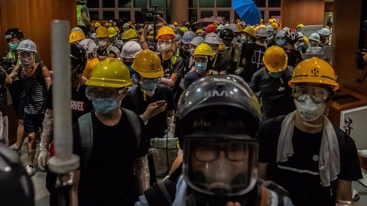 Hong Kong police evict protesters who stormed parliament