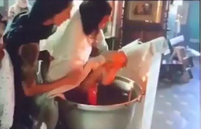 Russian priest suspended for violently baptizing a baby