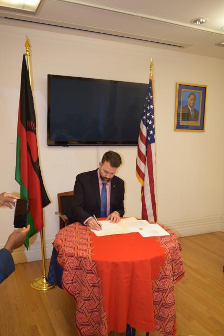 Malawians in Texas Pen Sawerengera protesting commissioning of American Jordan Price as the first ever Honorary Consul the State of Texas