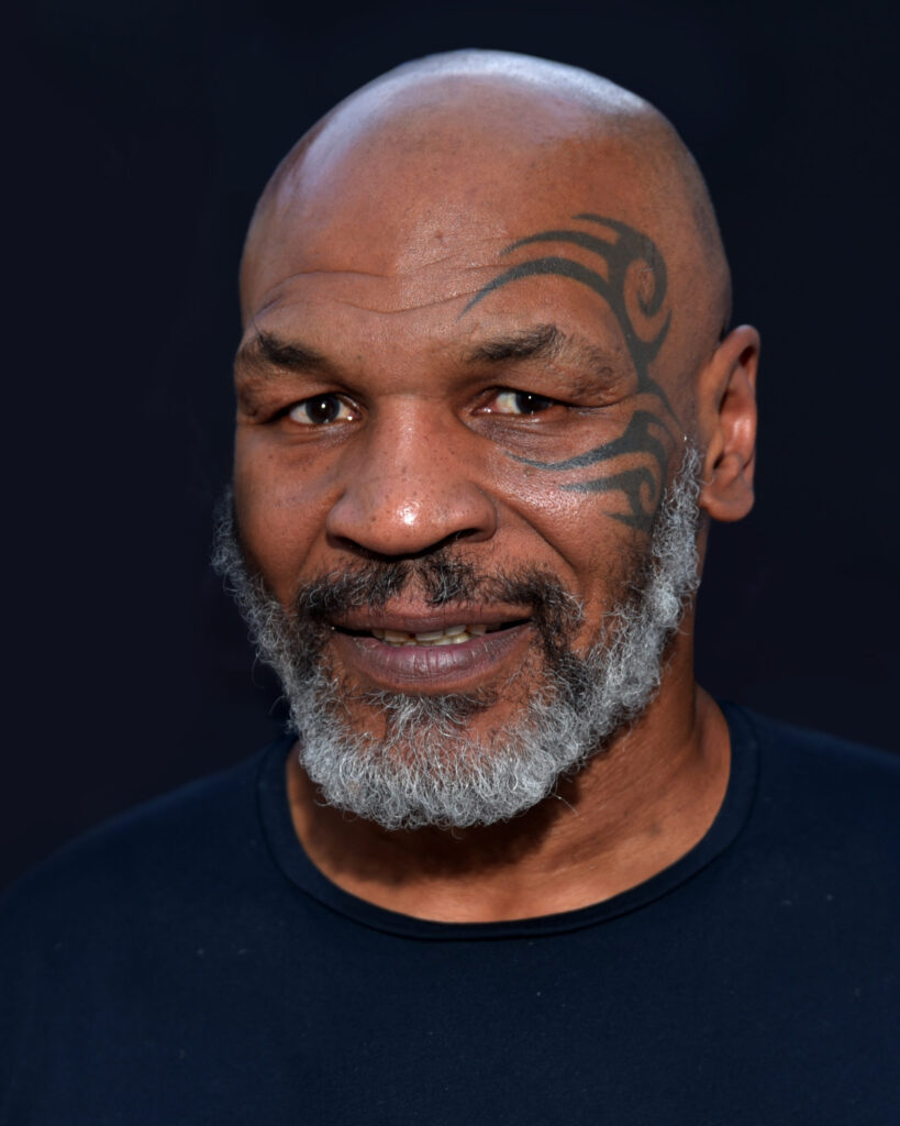 Mike Tyson punched a fellow prisoner to earn street cred