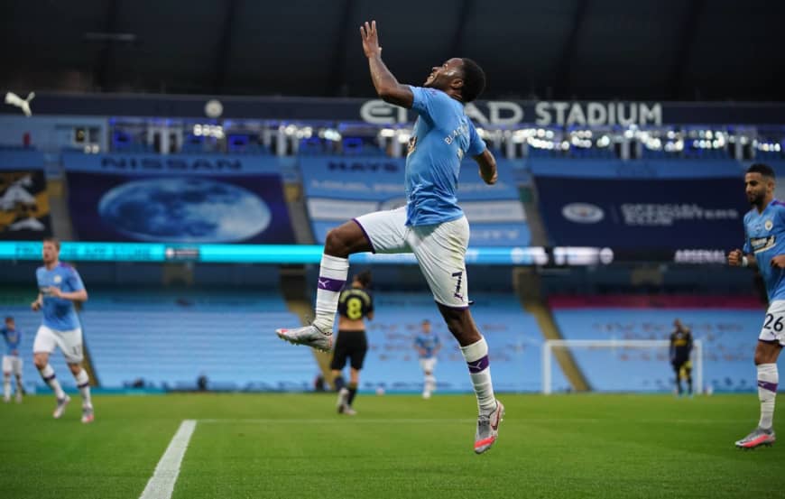 Manchester City beats Arsenal as Premier League makes emotional return