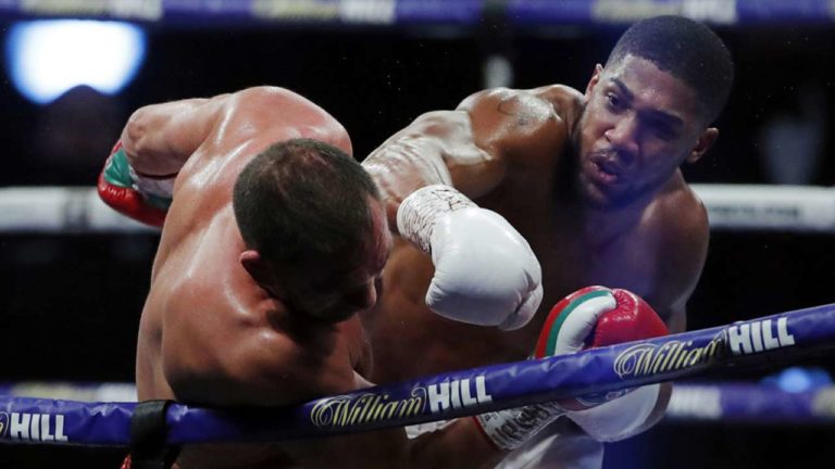 British-Nigerian boxer Anthony Joshua retains title in brutally knocks out against Pulex