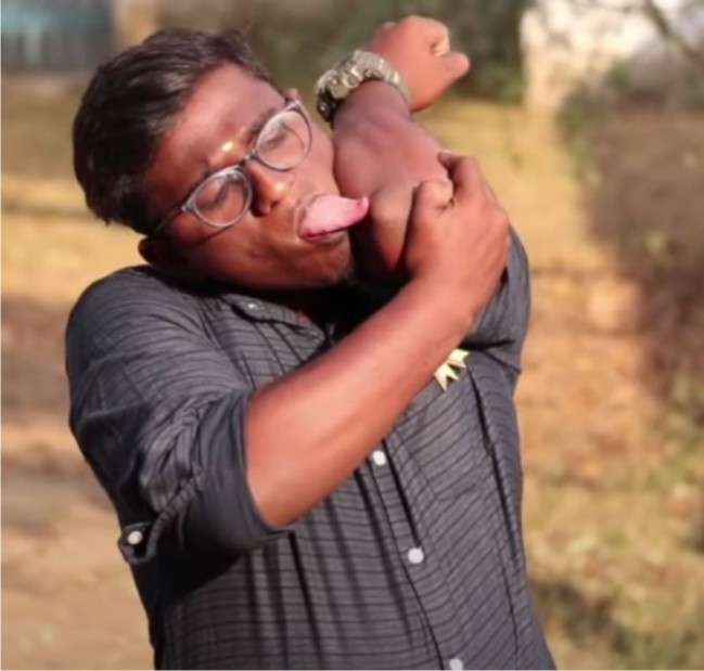 Amazing! Meet Indian man Praveen with “world’s longest tongue” who can lick elbow