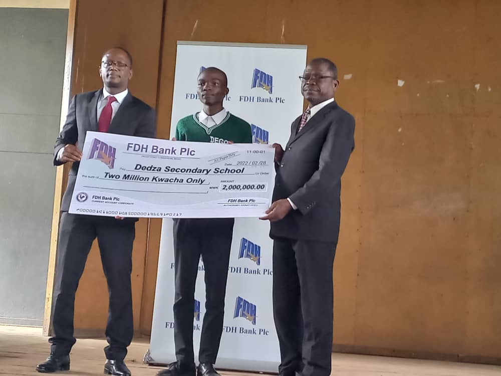 FDH bank plc aids Dedza Secondary School with textbooks, MK2m cash