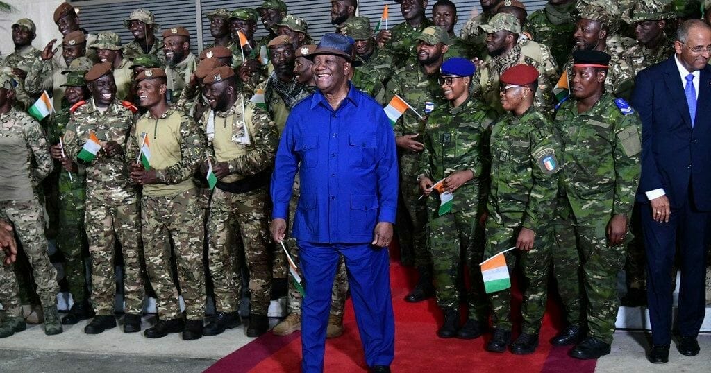 Pardoned Ivorian soldiers return home