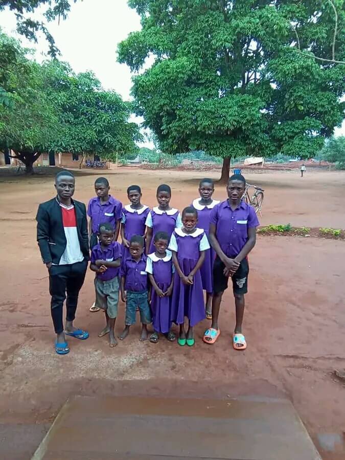 Local Tailor George Isaac Donates Uniforms to Needy Students at Chitedze Primary School