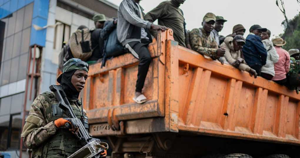 Red Cross escorts hundreds of stranded Congolese soldiers from rebel-controlled city to capital