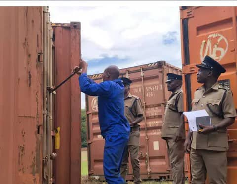 Refugees smile as court orders police to release confiscated containers