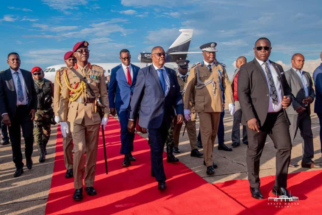 Mutharika returns from private trip